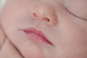 Baby boy newborn pure close up lips and nose