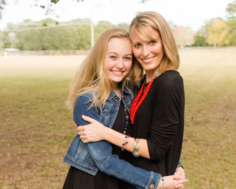 Family photos mom with teen daughter at their home in sunshine