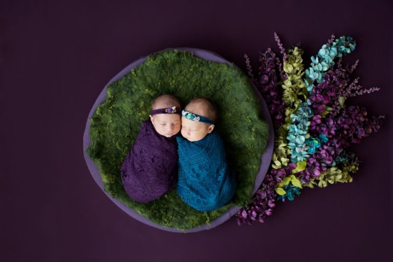 Newborn Twin Girls with Teal and Purple Flower Baby Setup in Gainesville Florida