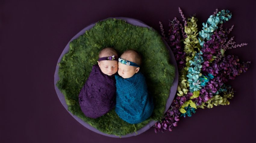 Newborn Twin Girls with Teal and Purple Flower Baby Setup in Gainesville Florida