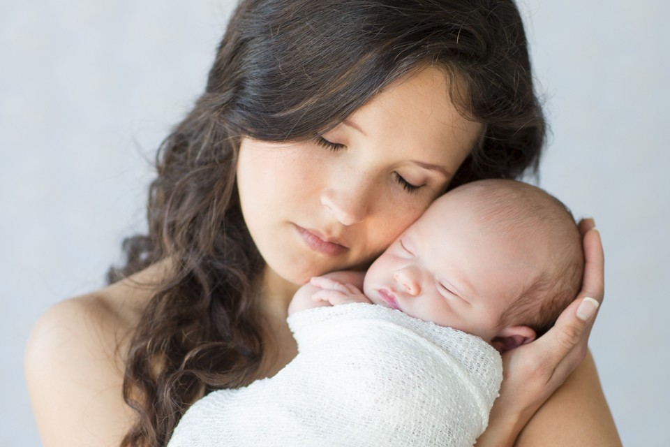 Mom totally in love with newborn baby girl photo Gainesville Florida