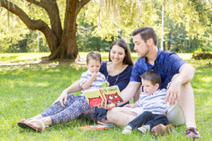 Reading Favorite Book to Two-Year-Old Twin Boys for Family Portrait taken in Tioga, Florida