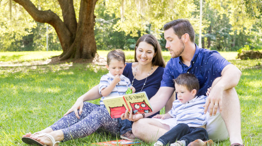 Reading Favorite Book to Two-Year-Old Twin Boys for Family Portrait taken in Tioga, Florida