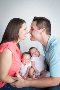 Family with Newborn Twin Boys Posed for Family Portrait taken in Gainesville, Florida