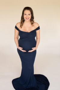 April with Maternity photos in navy gown carrying Twin girls in Gainesville Florida-15
