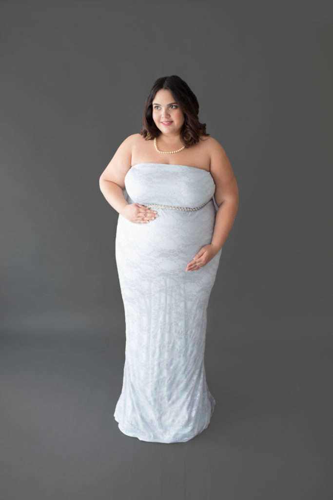 Maternity Indoor Photos of Pregnant Adelis in Blue Lace gown and Pearls in Alachua Florida