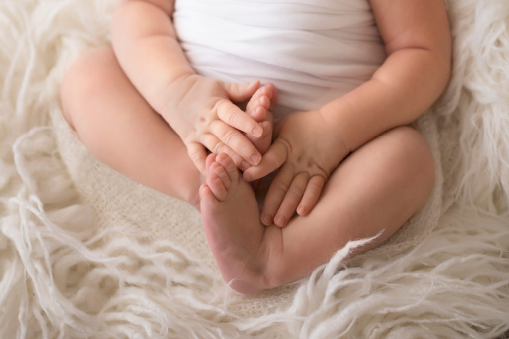 Newborn baby Bailey two feet and two hands close up photo Gainesville FL Andrea Sollenberger Photography