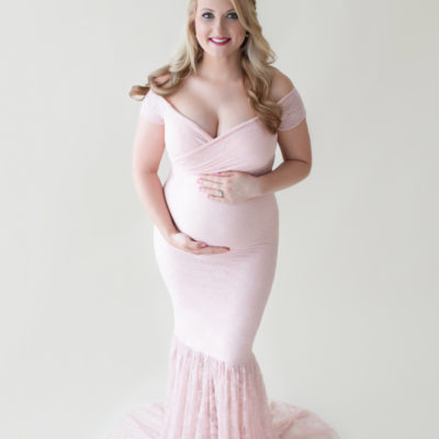 Maternity photos Christina posed fashion cover girl style showing beautiful belly bump wearing mermaid style full length pale pink lace gown Maternity Baby Photographer FL Gainesville