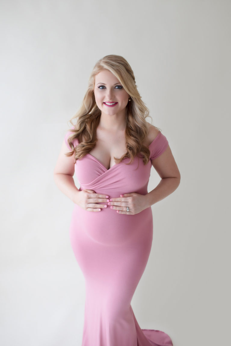 Maternity photos Christina fashion posed as cover girl wearing mermaid style full length rose pink gown Maternity Baby Photographer FL Gainesville