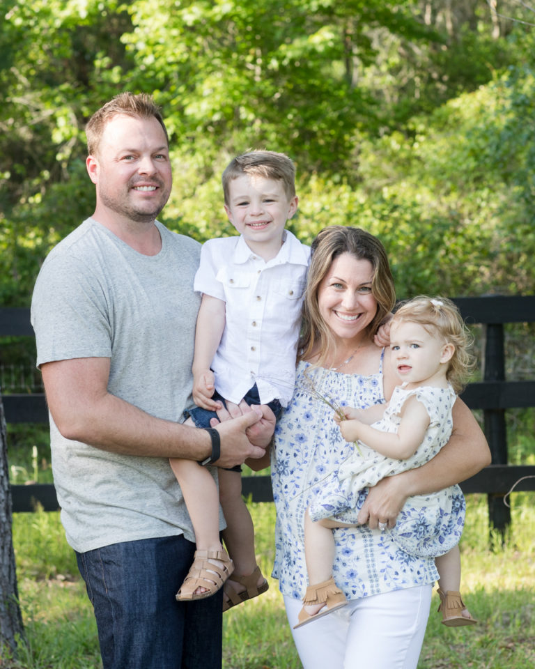 Gorgeous family toddlers dressed in white blue and flowers outside photo Williston Florida