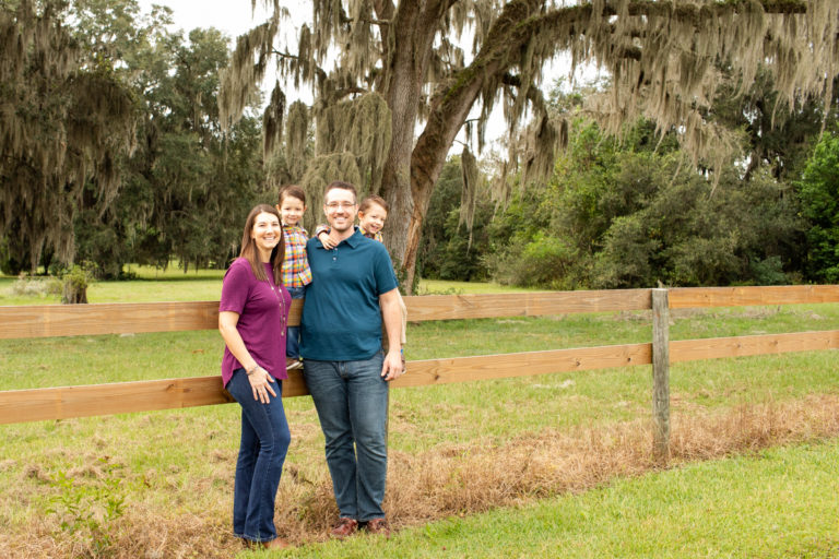 Family Photos Three Year Old Twin Boys leaning on fence at Horseshoe Farm Alachua Florida