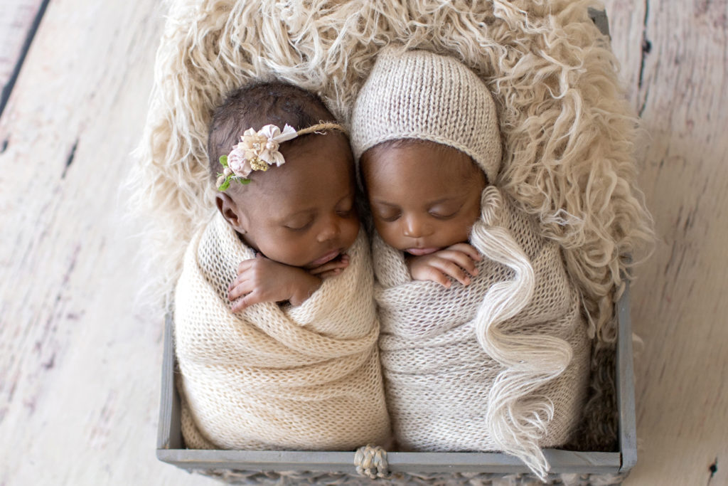 Twin Newborns Samuel and Sophia matching potato sack beige knit wraps bonnet fur stuffed basket Gainesville Florida newborn photos