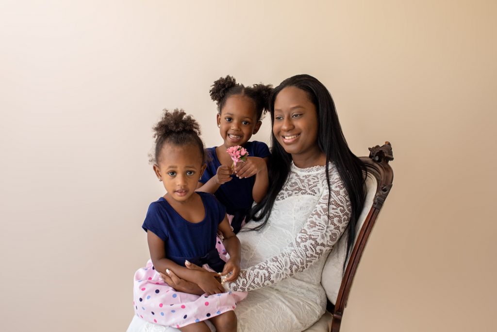 christine white lace maternity gown expectant mama poses with two daughters