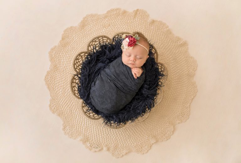 mini newborn photo session girl with navy lace in basket floral headtie Gainesville FL