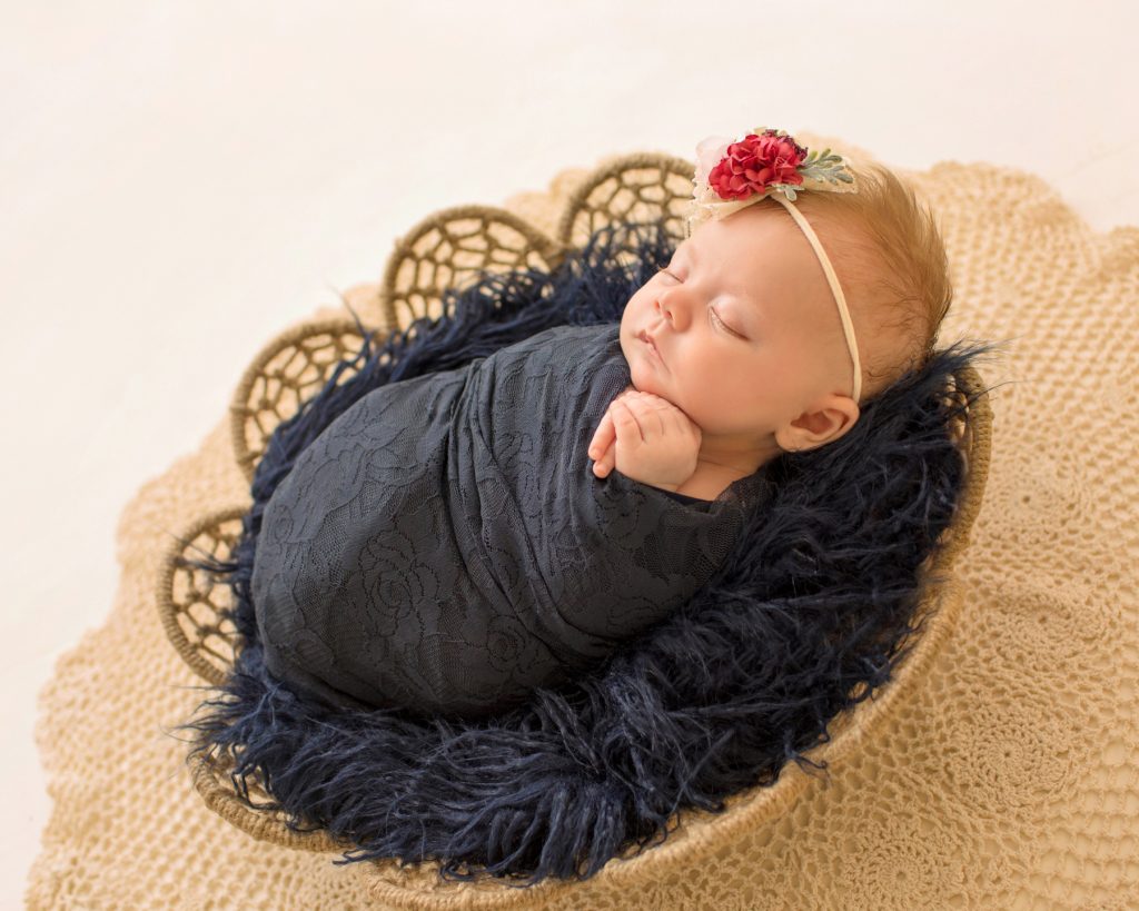 mini newborn photo session girl with navy lace in basket floral headtie Gainesville FL