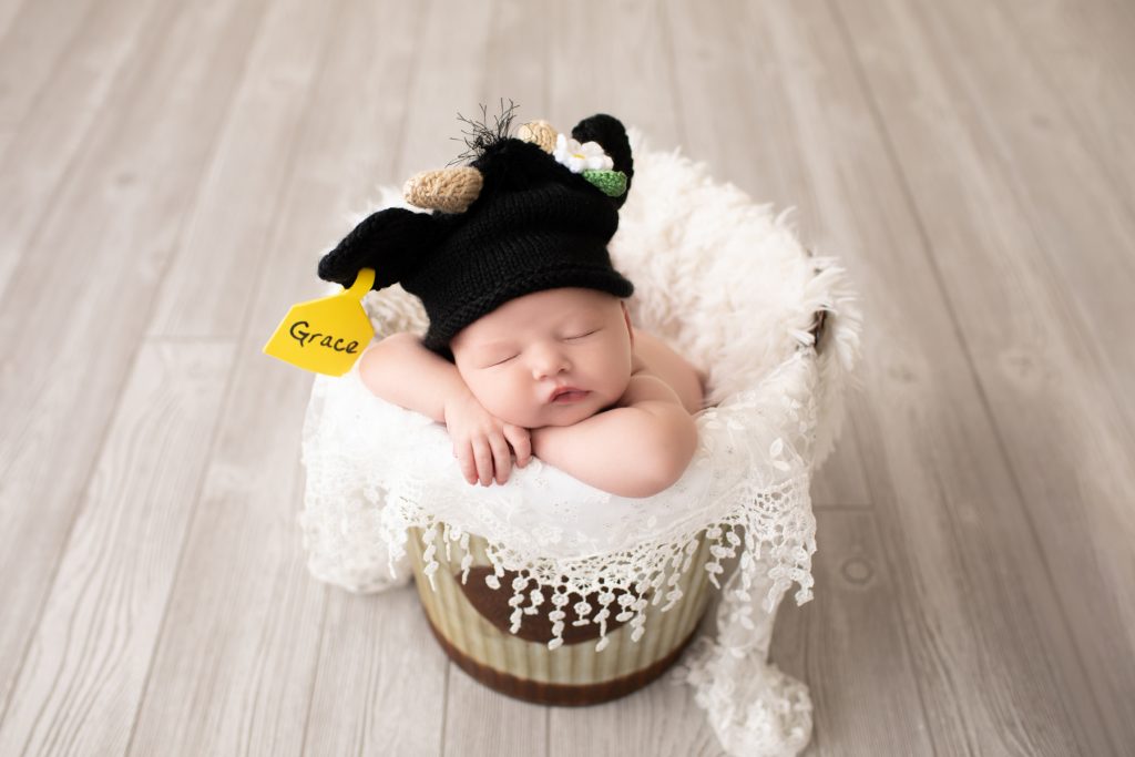 newborn in a bucket