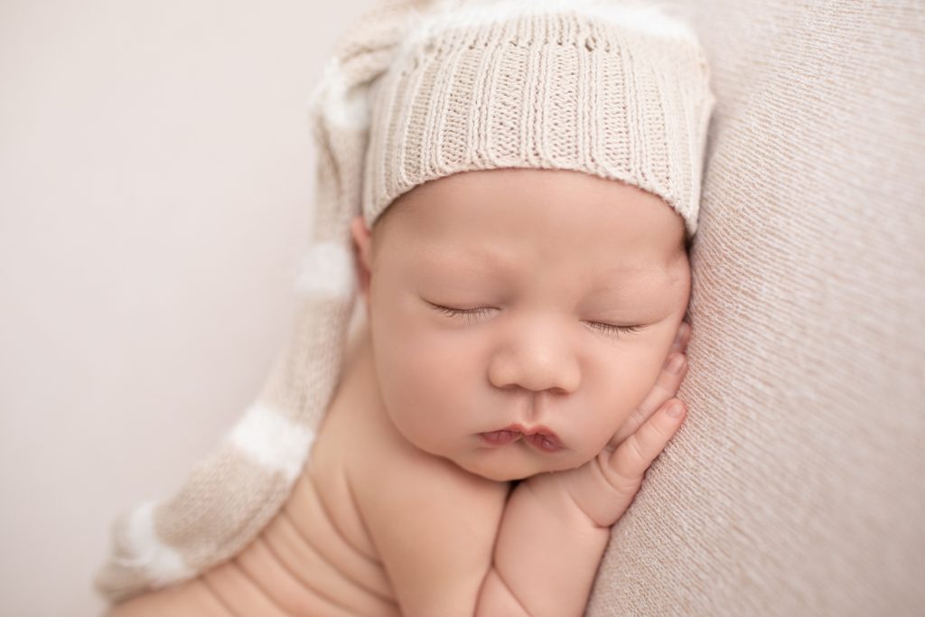 Beautiful Baby Boy 6 month old poses in his diaper on white Stock Photo -  Alamy