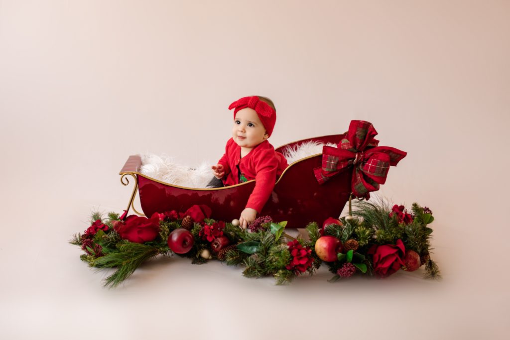 Baby in Sleigh Holiday Photos Gainesville, Florida