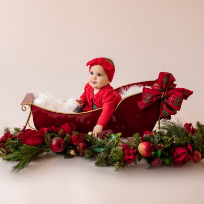 Baby in Sleigh Holiday Photos Gainesville, Florida