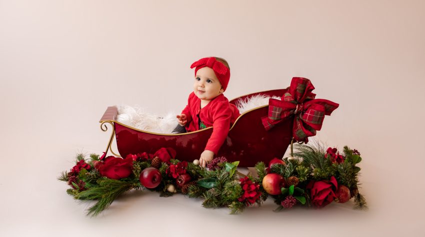 Baby in Sleigh Holiday Photos Gainesville, Florida