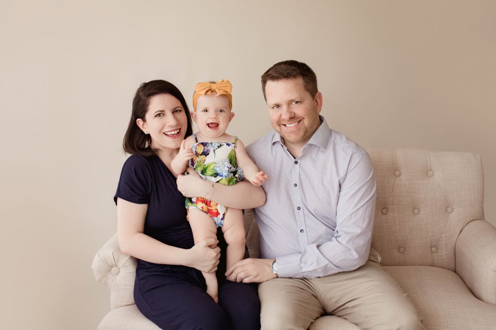 Baby Girl with Mom and Dad for One Year Milestone Photos
