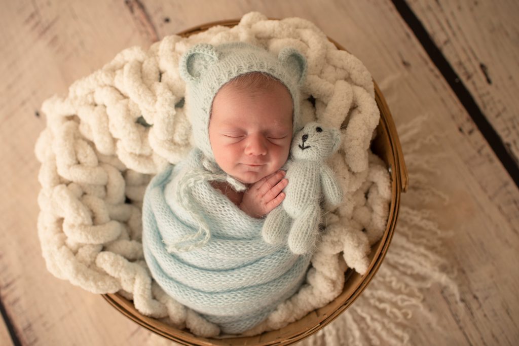 Sweet Baby Tobi Bundled Like a Teddy Bear for Newborn Photo Session in Gainesville, FL