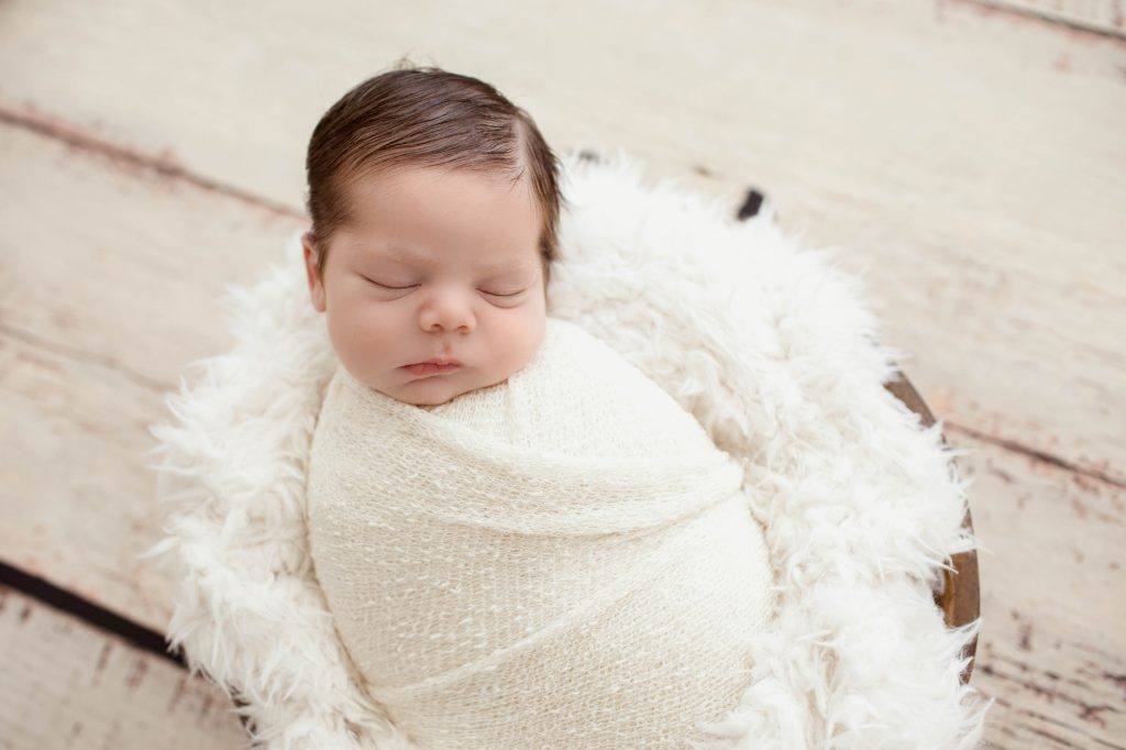 Newborn Baby Swaddled in White & Sleeping Gainesville, FL