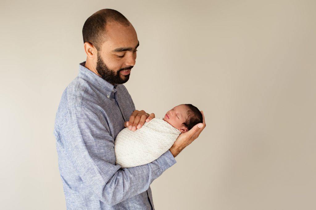 Dad and Newborn Son Professional Newborn Portraits Gainesville FL