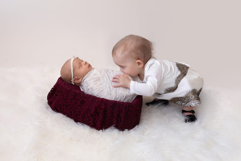 Newborn with Sibling Creative Photo