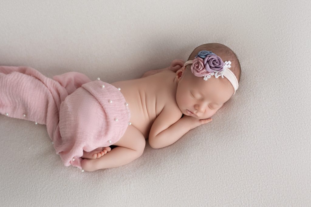 Newborn Baby Girl in Pastel Pink Photo Session