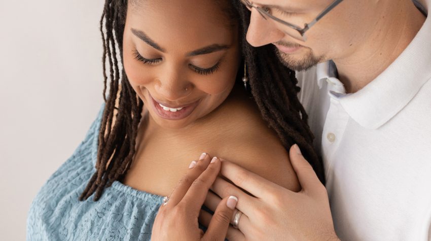 Mom and Dad Pose for Professional Maternity Photo Session